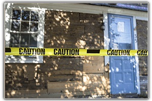 crime scene, caution taped off house